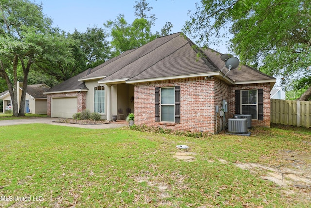 63722 N Diamondhead Dr, Diamondhead, MS 39525 - view of front of home with a garage, cooling unit, driveway, a shingled roof, and brick siding