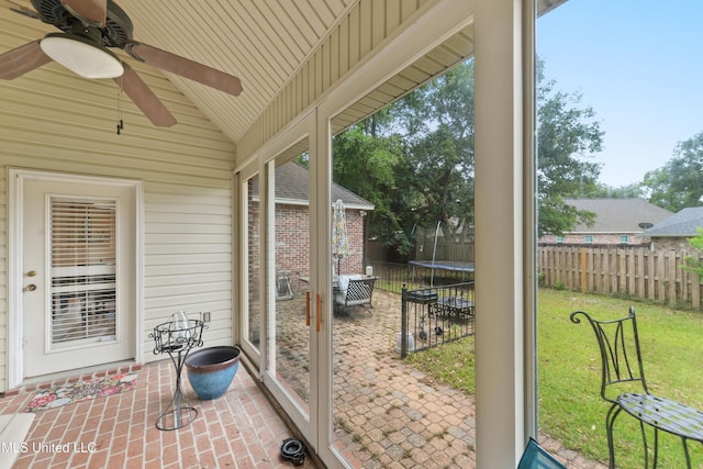 63722 N Diamondhead Dr, Diamondhead, MS 39525 - unfurnished sunroom featuring ceiling fan and vaulted ceiling