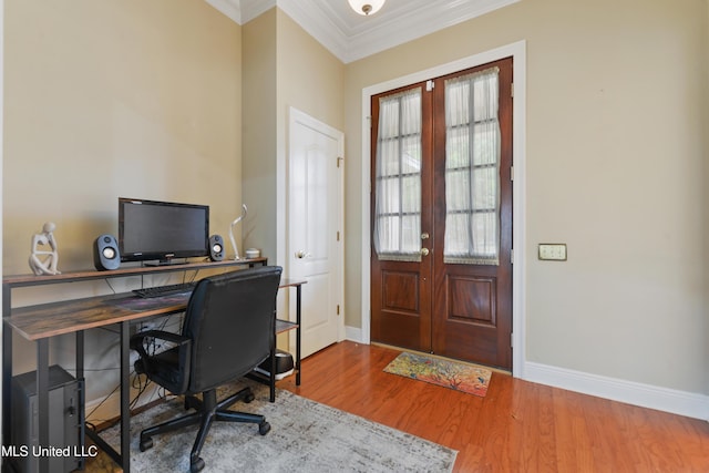 63722 N Diamondhead Dr, Diamondhead, MS 39525 - office area featuring crown molding, baseboards, wood finished floors, and french doors