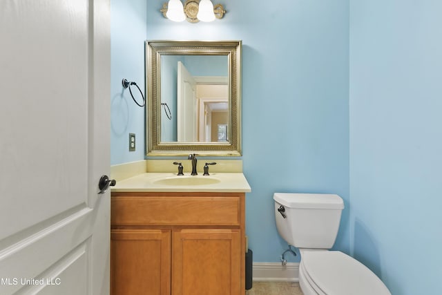 63722 N Diamondhead Dr, Diamondhead, MS 39525 - bathroom featuring toilet and vanity