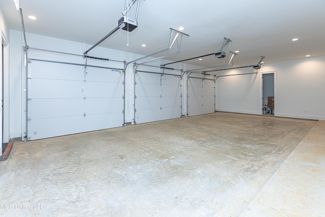 garage featuring a garage door opener