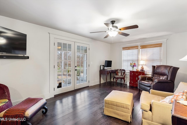 living area with french doors, ceiling fan, baseboards, and wood finished floors