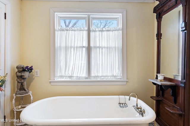 full bathroom with a soaking tub