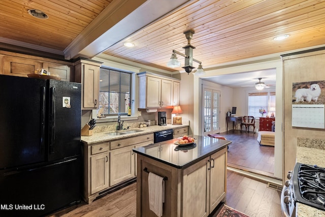 kitchen with black appliances, crown molding, dark wood-type flooring, and a sink