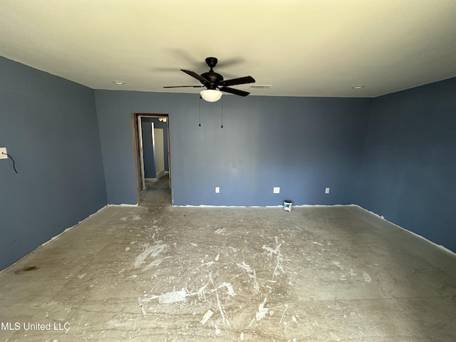 unfurnished room featuring visible vents and ceiling fan