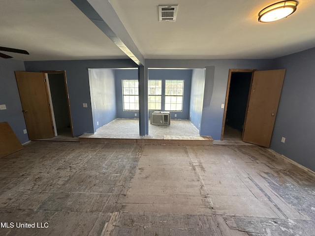 spare room with visible vents and ceiling fan