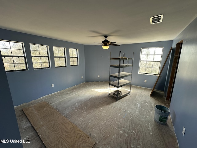 unfurnished bedroom with visible vents and ceiling fan