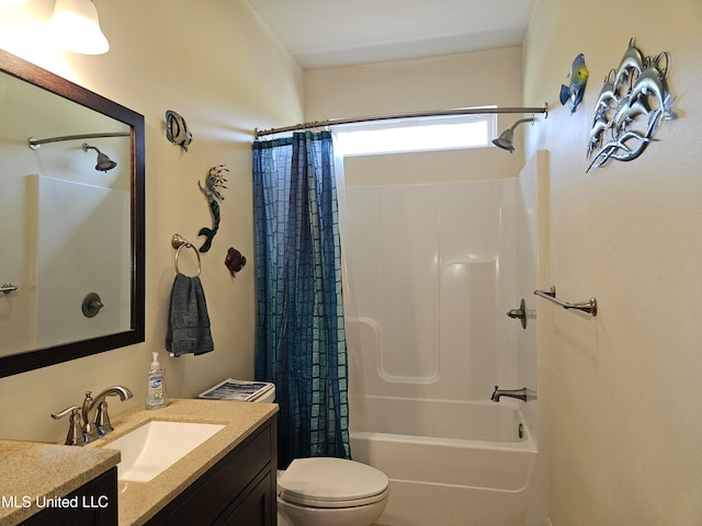 full bathroom featuring vanity, toilet, and shower / bath combo with shower curtain