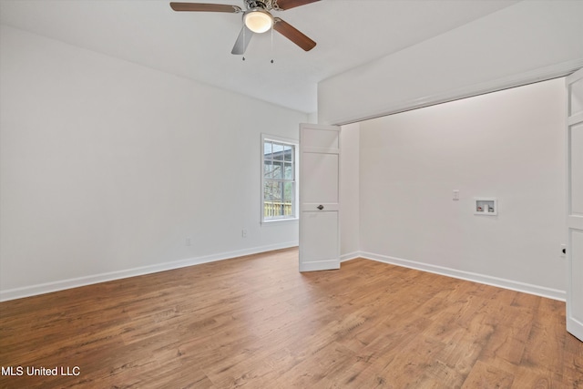 unfurnished room featuring ceiling fan and light hardwood / wood-style flooring