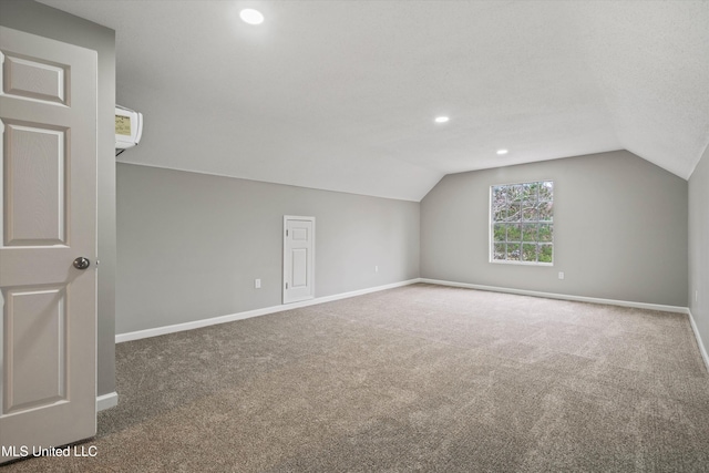 bonus room featuring carpet flooring and lofted ceiling