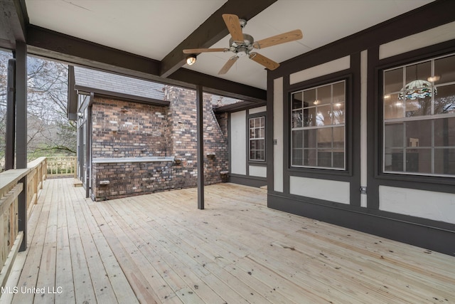 wooden terrace with ceiling fan