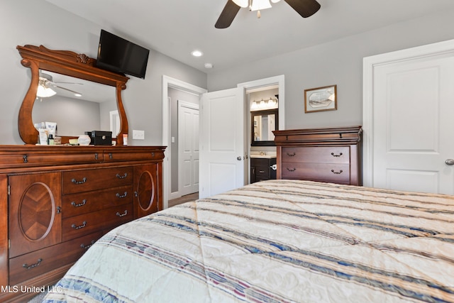 bedroom featuring recessed lighting, ceiling fan, and ensuite bath