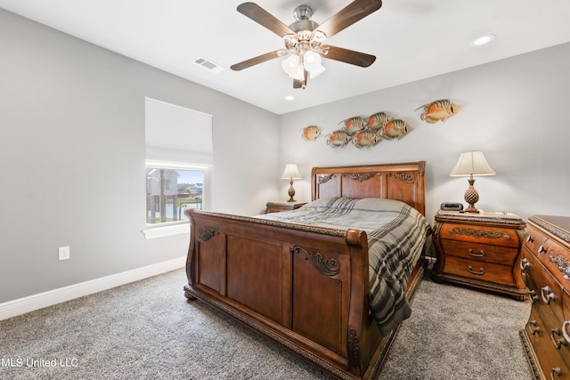 bedroom featuring baseboards, visible vents, a ceiling fan, light colored carpet, and recessed lighting