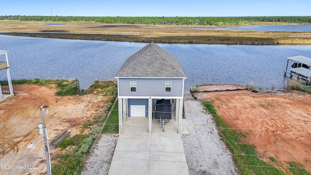 exterior space with a water view