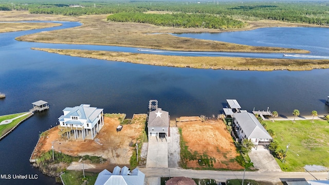 drone / aerial view with a water view