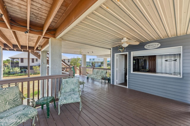 wooden deck with ceiling fan