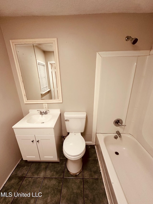 143 James Dr, Gulfport, MS 39503 - full bath with a tub to relax in, vanity, tile patterned flooring, and toilet