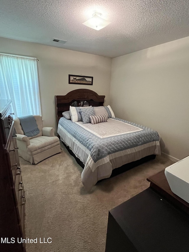 7605 Davis Pkwy, Southaven, MS 38671 - bedroom with carpet and a textured ceiling
