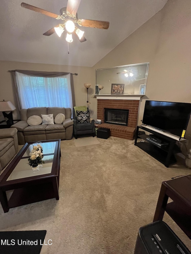 7605 Davis Pkwy, Southaven, MS 38671 - carpeted living room featuring vaulted ceiling, a ceiling fan, and a fireplace