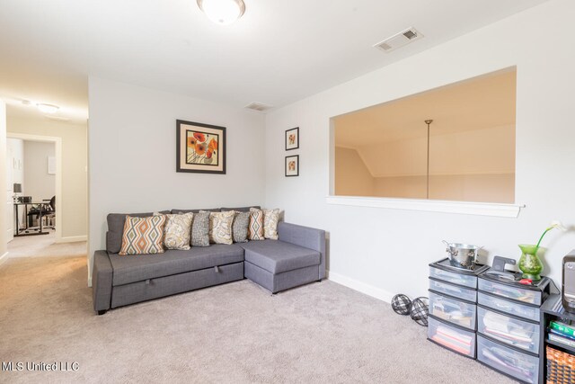 living room featuring light colored carpet