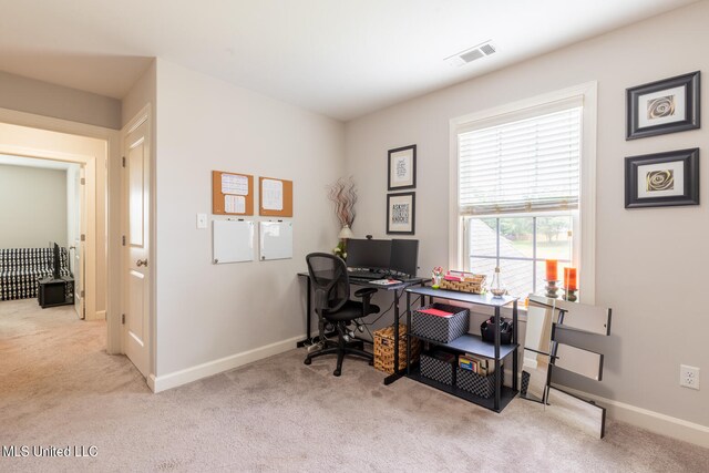 view of carpeted office space