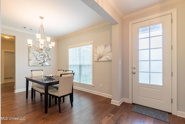 dining room with dark wood-type flooring, crown molding, a chandelier, and plenty of natural light