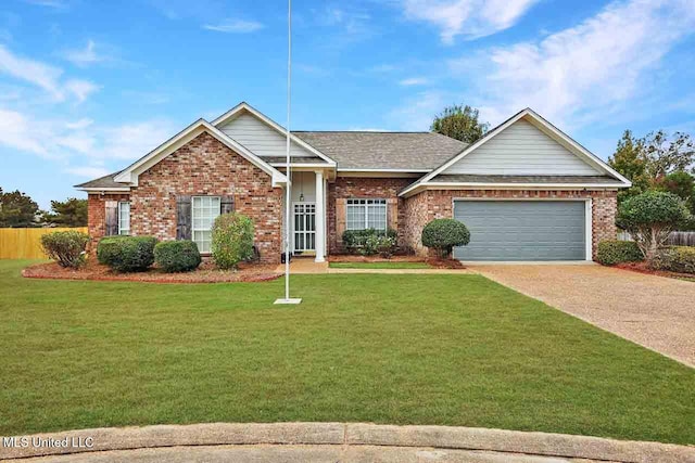 view of front facade featuring a front yard and a garage