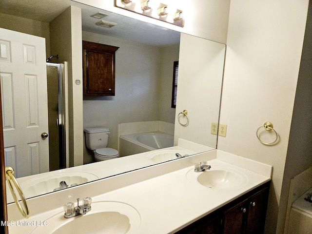 109 Stanton Hall Dr, Florence, MS 39073 - full bath featuring a bath, double vanity, a sink, and toilet