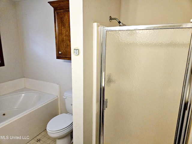 109 Stanton Hall Dr, Florence, MS 39073 - bathroom featuring a shower stall, tile patterned floors, toilet, and a bath