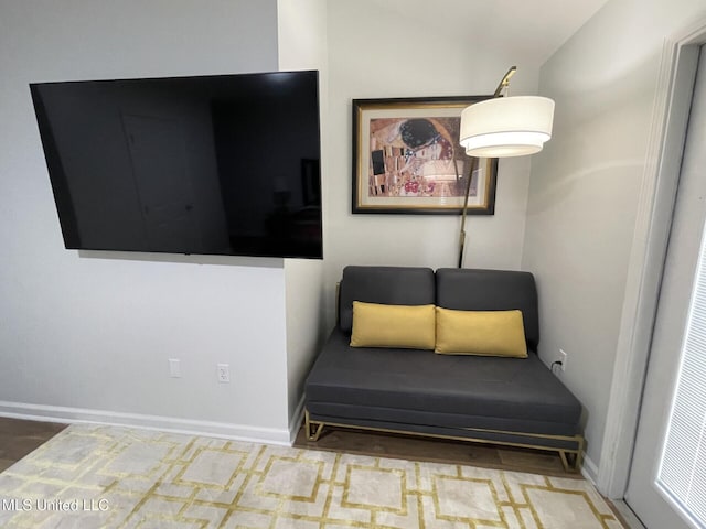 1276 Century Oaks Dr Unit B, Gulfport, MS 39507 - sitting room with lofted ceiling and baseboards