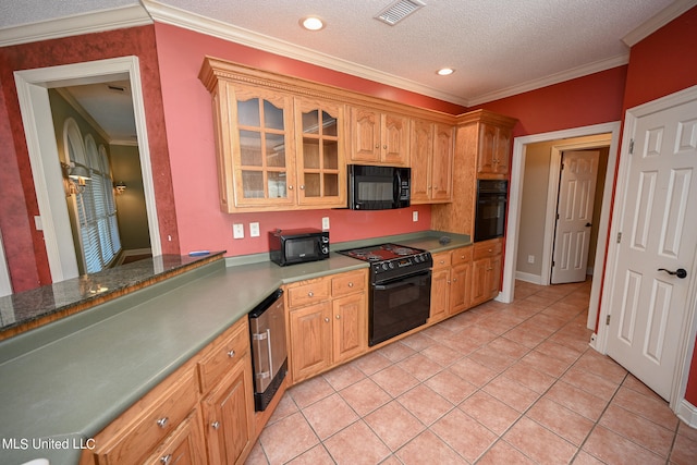 kitchen featuring crown molding, a textured ceiling, and black appliances