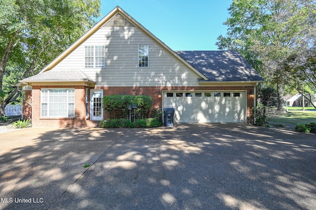 view of front of property featuring a garage