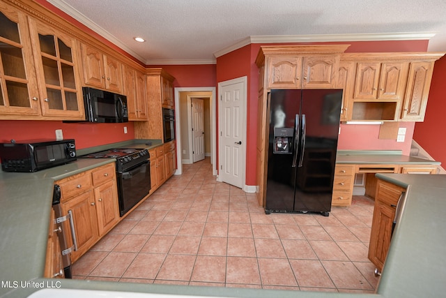 kitchen featuring crown molding, a textured ceiling, black appliances, and light tile patterned flooring