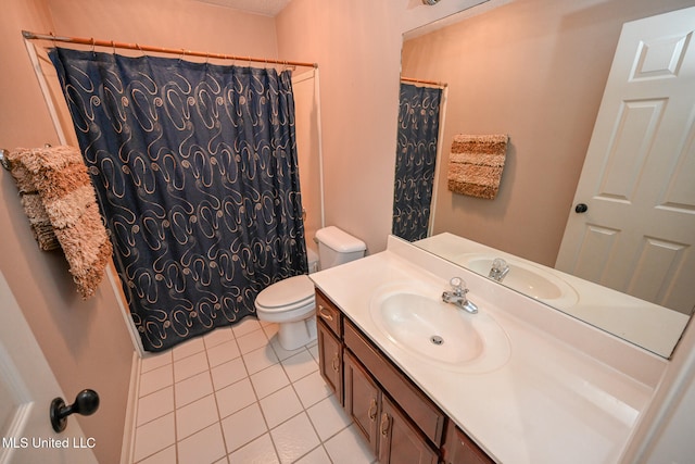 bathroom with vanity, a shower with curtain, toilet, and tile patterned flooring