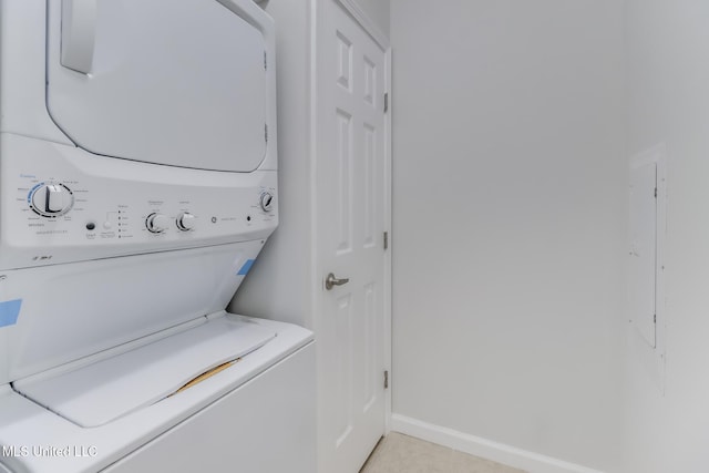 1515 E Beach Blvd Unit 132, Pass Christian, MS 39571 - washroom with stacked washing machine and dryer and electric panel