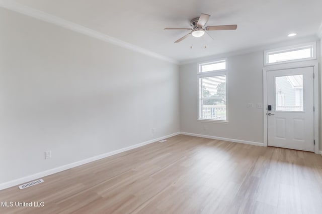 1515 E Beach Blvd Unit 132, Pass Christian, MS 39571 - foyer with light wood-style floors, ornamental molding, and a ceiling fan