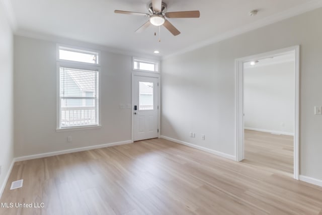 1515 E Beach Blvd Unit 132, Pass Christian, MS 39571 - entrance foyer with light wood finished floors, ceiling fan, and ornamental molding