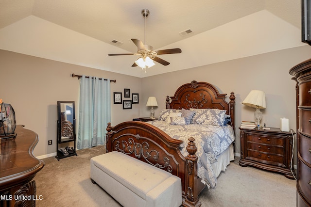 carpeted bedroom featuring lofted ceiling and ceiling fan