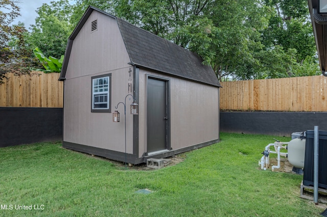 view of outdoor structure featuring a yard