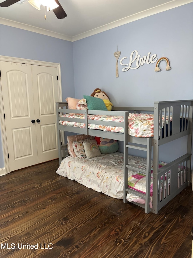 103 Sweetbriar Cir, Canton, MS 39046 - bedroom featuring ornamental molding, wood finished floors, a closet, and ceiling fan