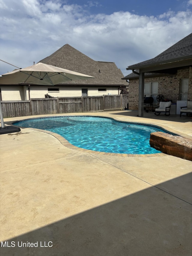 103 Sweetbriar Cir, Canton, MS 39046 - view of swimming pool with a patio area and a fenced backyard