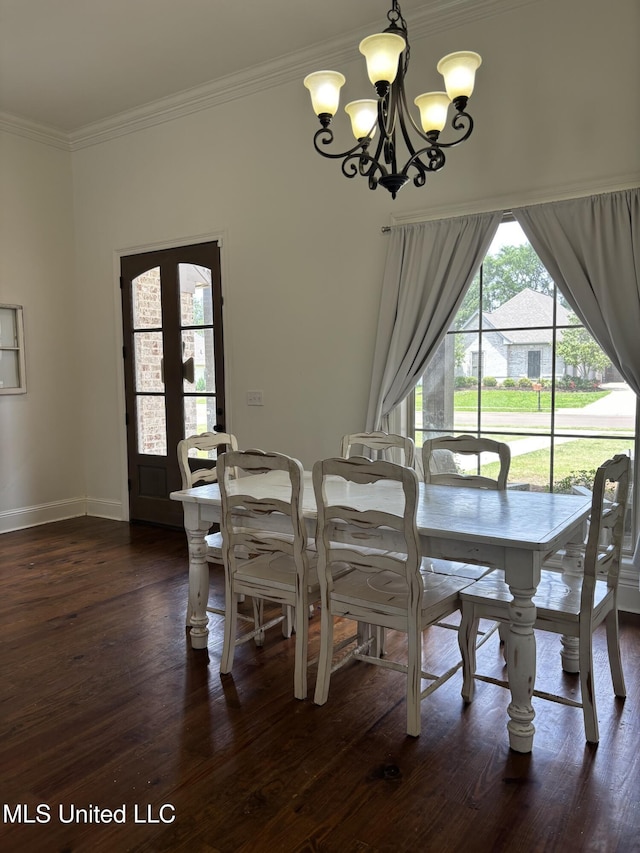 103 Sweetbriar Cir, Canton, MS 39046 - dining space with a chandelier, ornamental molding, dark wood-style flooring, and baseboards