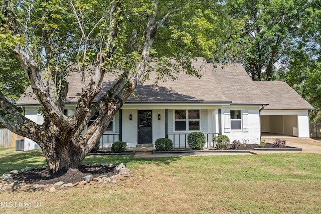 view of front of home with a porch, a front lawn, and central air condition unit