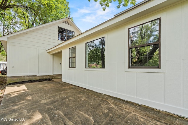 view of home's exterior with a patio