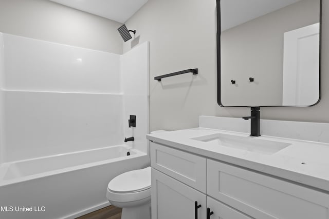 1457 Rue De Courmont, Gautier, MS 39553 - bathroom featuring vanity, bathing tub / shower combination, and wood finished floors