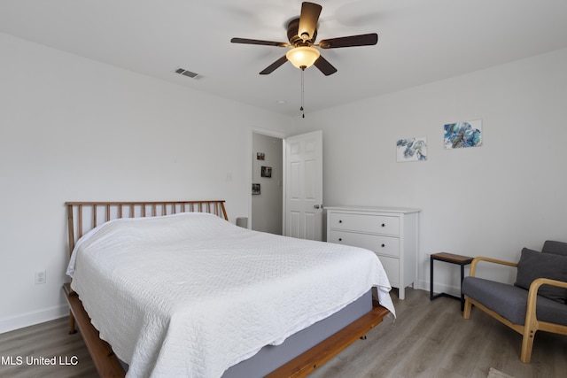 bedroom featuring ceiling fan and light wood-type flooring