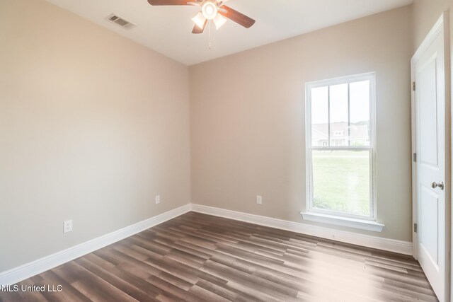 113 Magnolia Farms Dr, Lucedale, MS 39452 - unfurnished room with ceiling fan, dark wood-type flooring, and baseboards