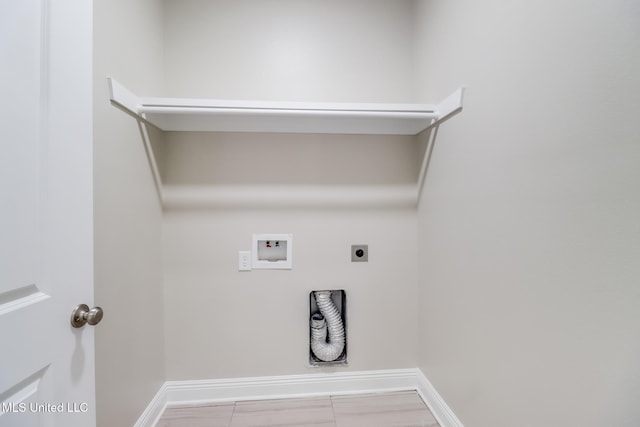 113 Magnolia Farms Dr, Lucedale, MS 39452 - laundry area featuring hookup for an electric dryer, washer hookup, and baseboards