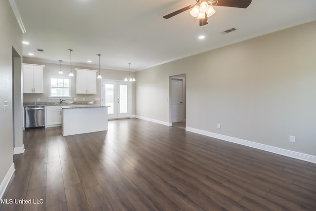 113 Magnolia Farms Dr, Lucedale, MS 39452 - unfurnished living room featuring a ceiling fan, dark wood-style floors, recessed lighting, baseboards, and ornamental molding