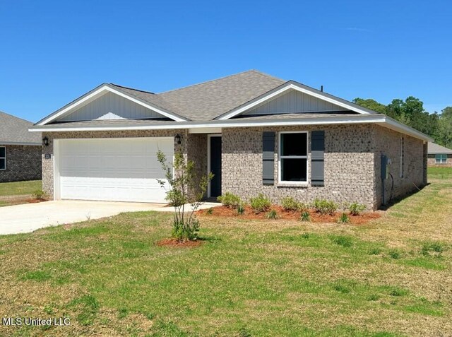 ranch-style home featuring a front yard and a garage